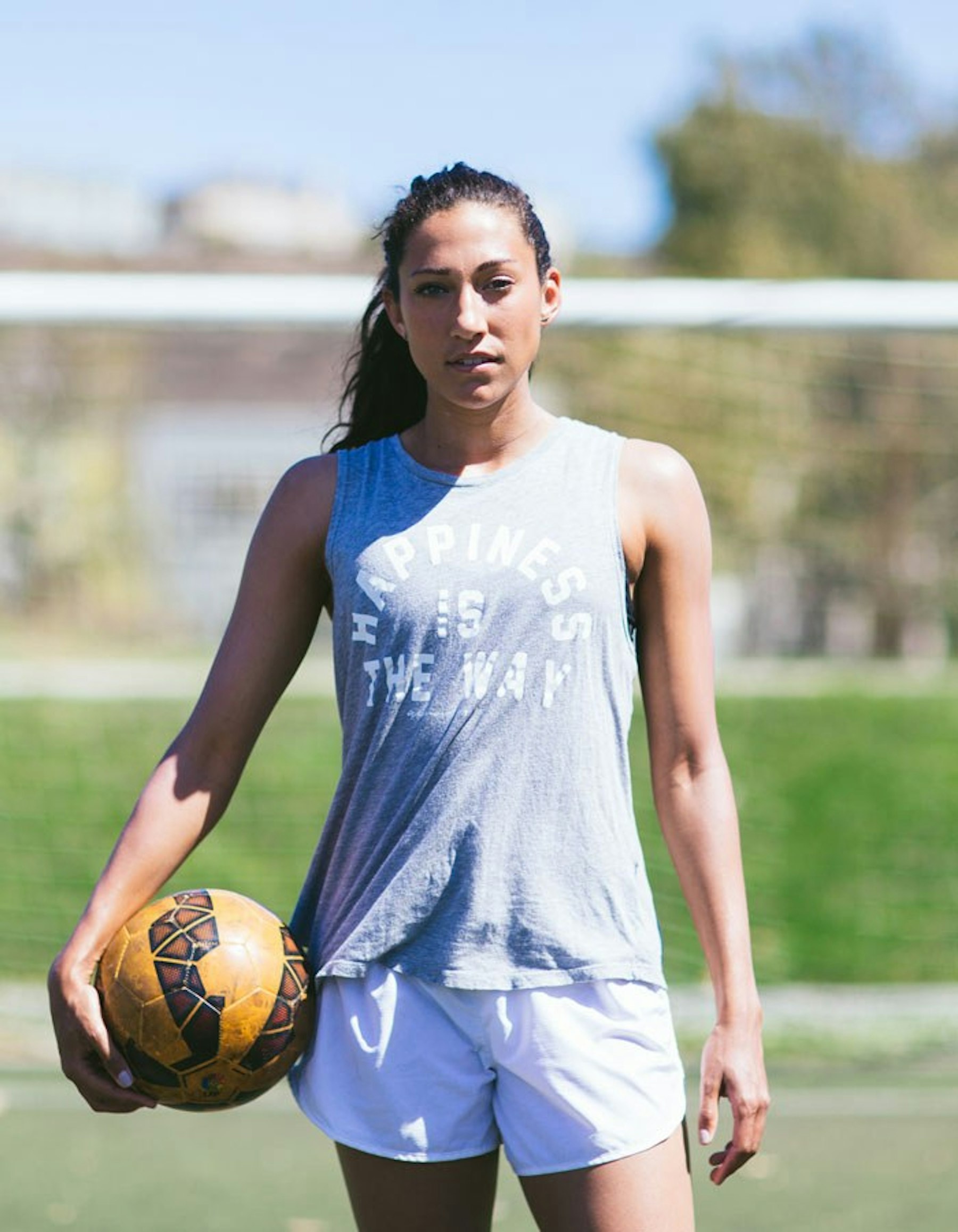 Christen Press with soccer ball