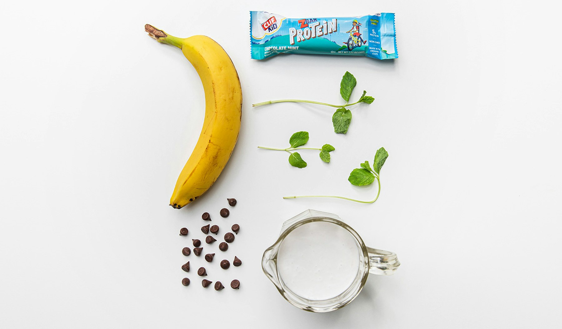 Young grasshopper smoothie ingredients laid out on a table