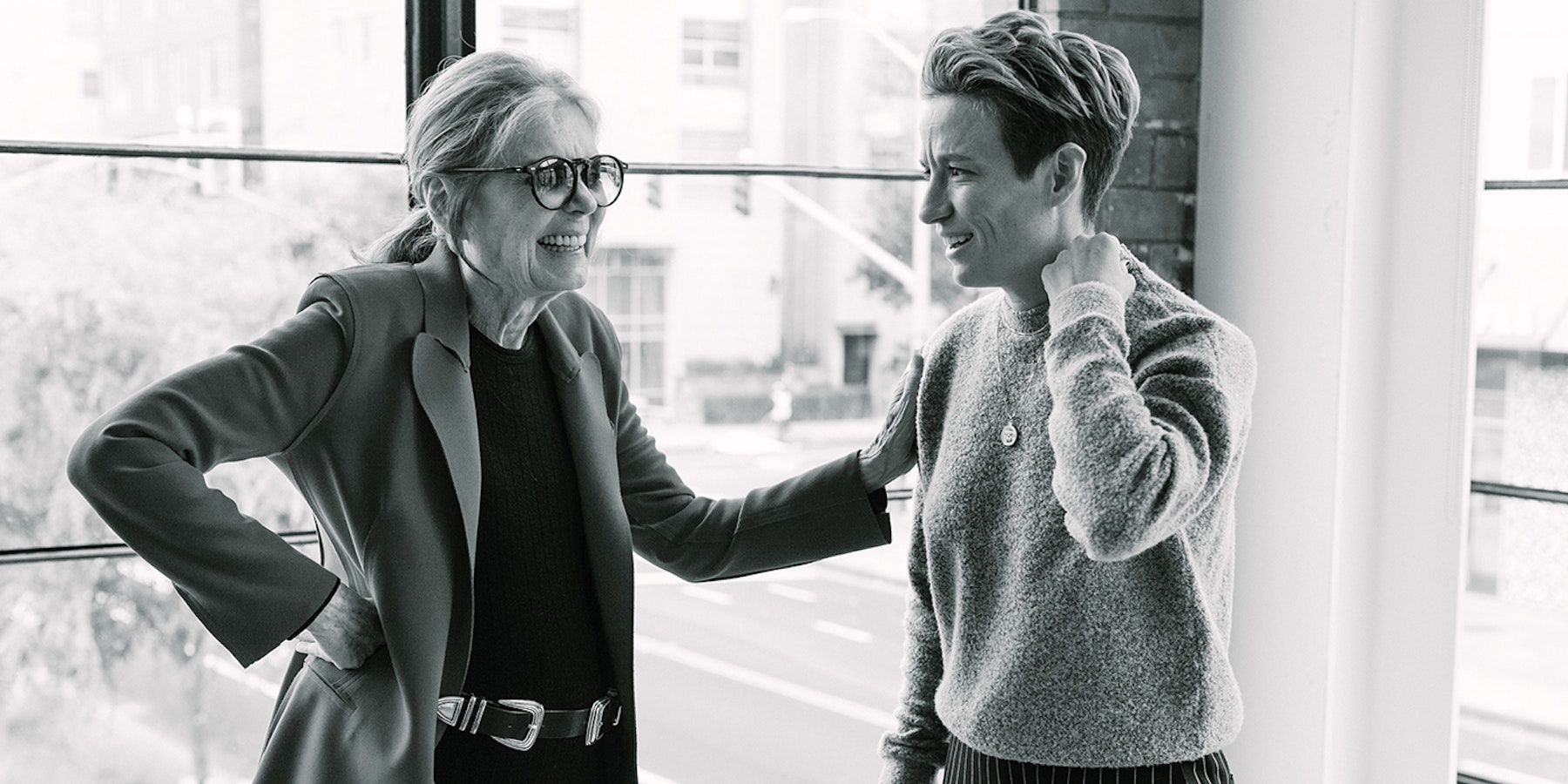 Megan Rapinoe Gloria Steinem In Front of Window