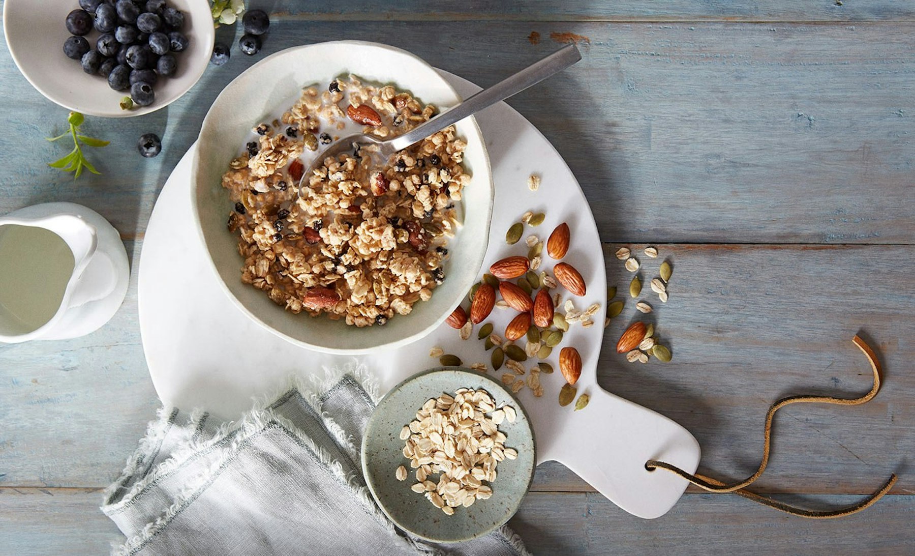 Bowl of granola with blueberries and almonds